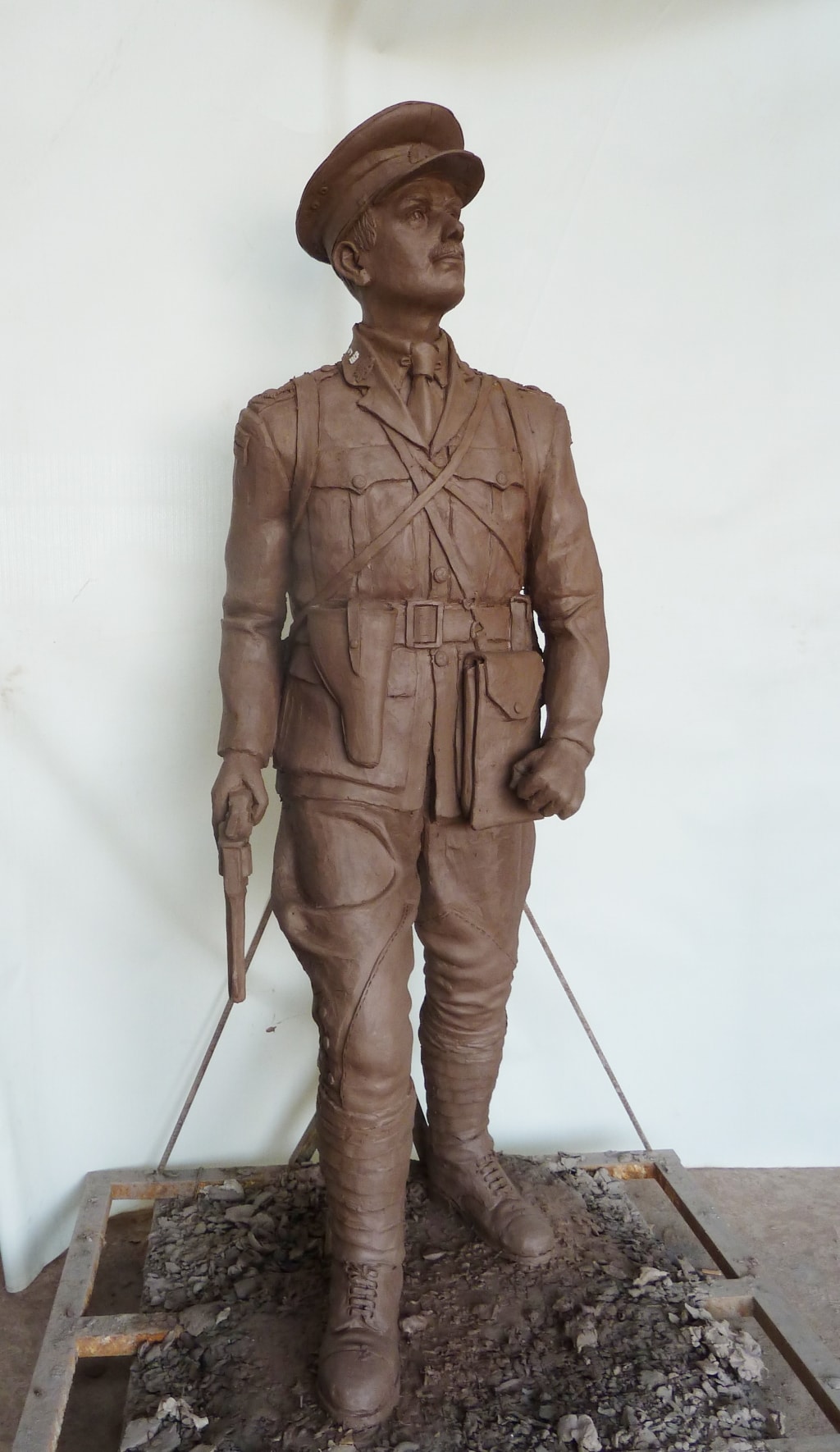 Front view of the clay mould for a bronze memorial statue
