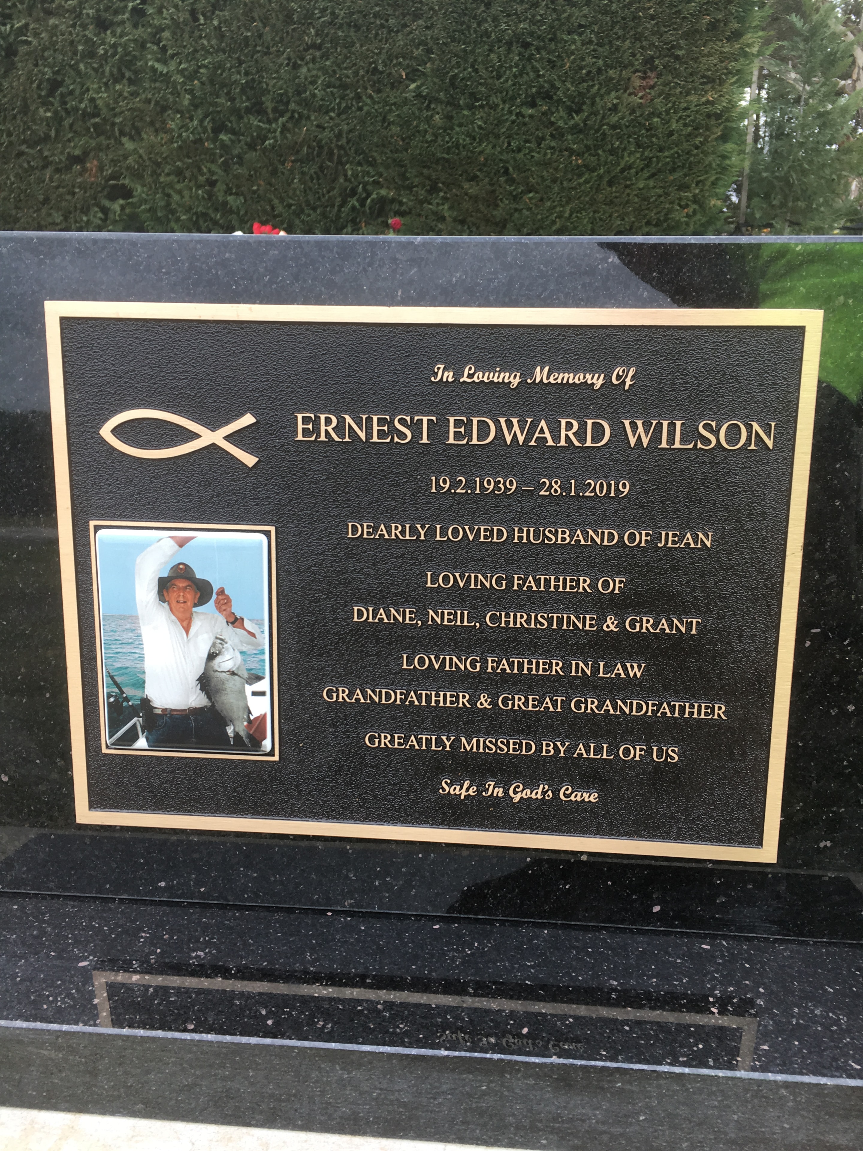 Ernest Edward Wilson memorial plaque with portrait