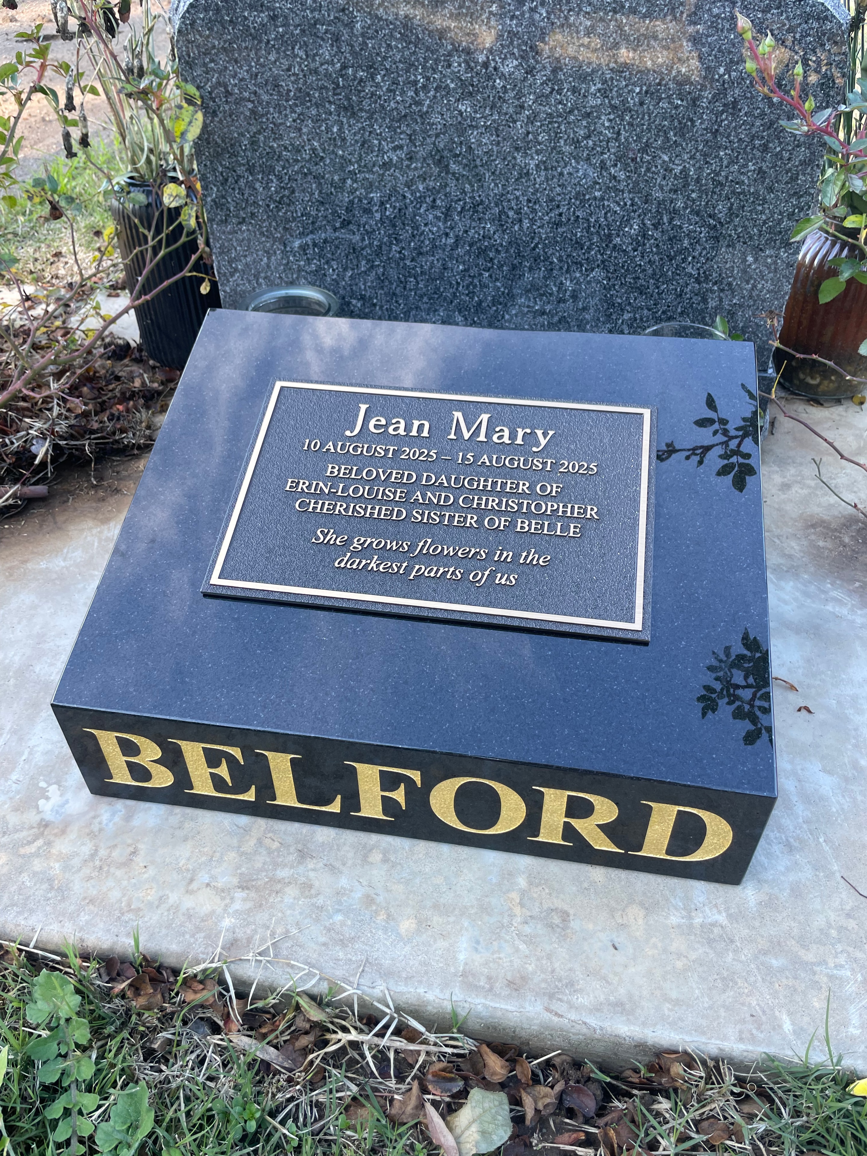 Jean Mary Belford bronze plaque on polished granite memorial base