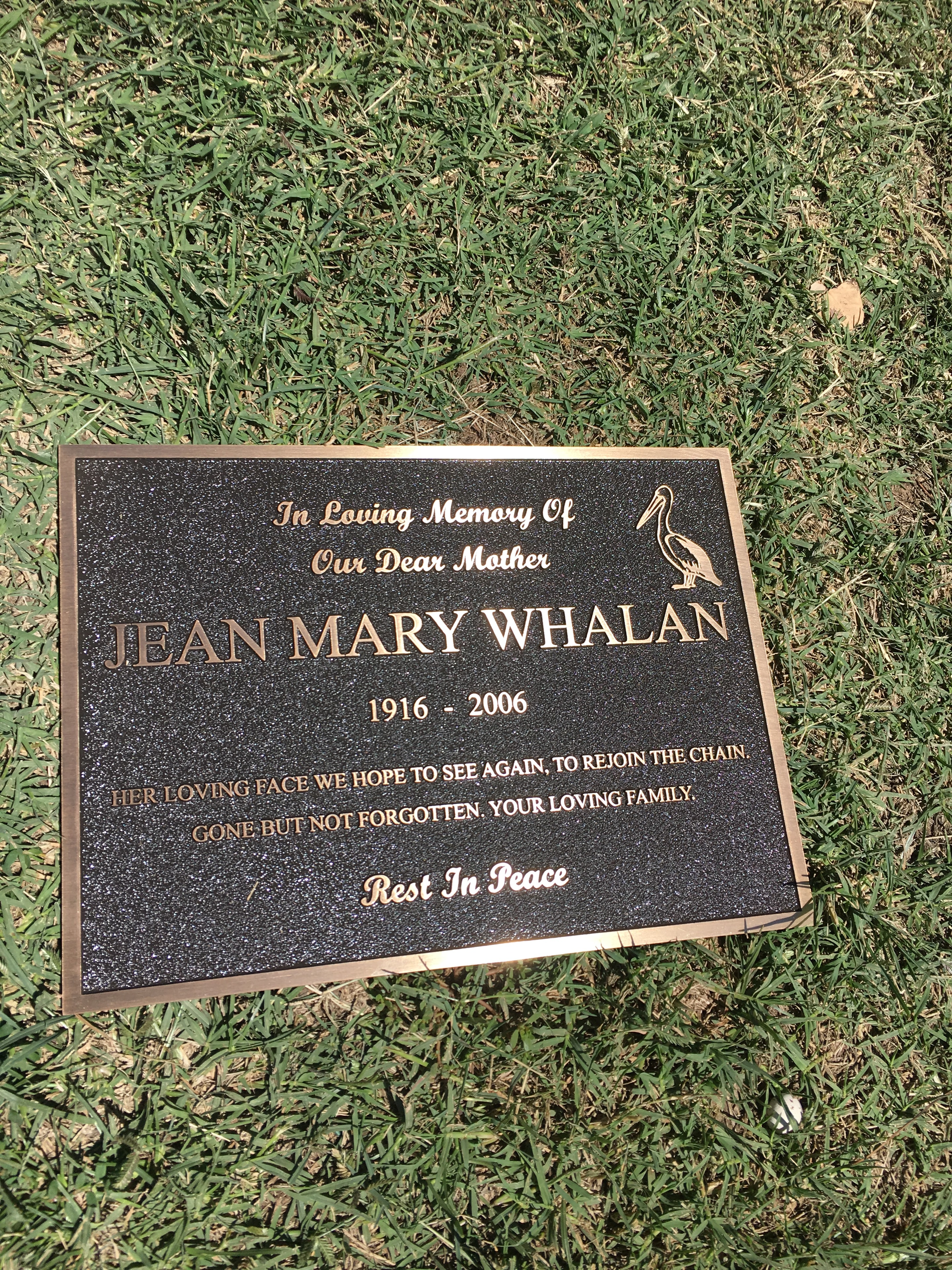 Jean Mary Whelan memorial plaque with pelican motif