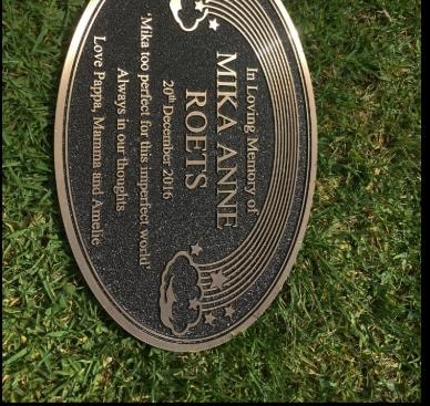 Mika Anne Roets oval rainbow memorial plaque