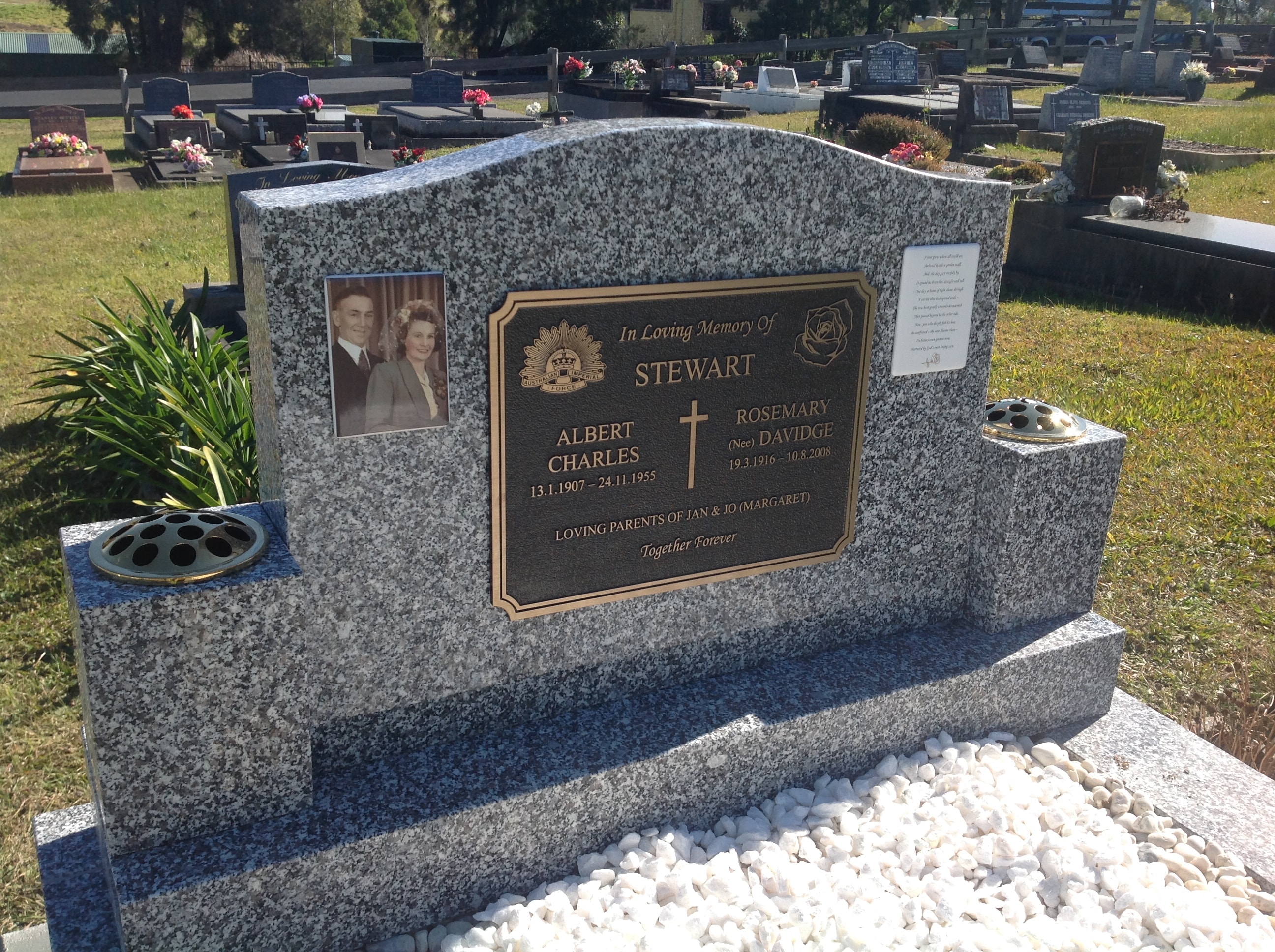 Stewart family memorial plaque on granite monument